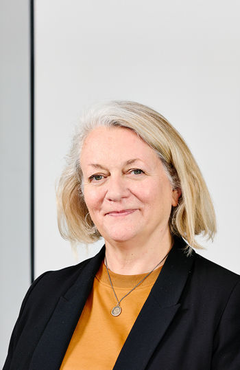 A person in black suit.