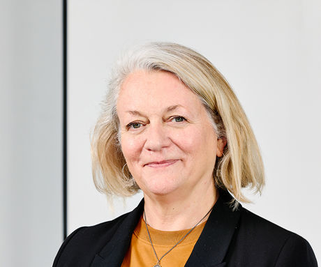 A person in black suit.