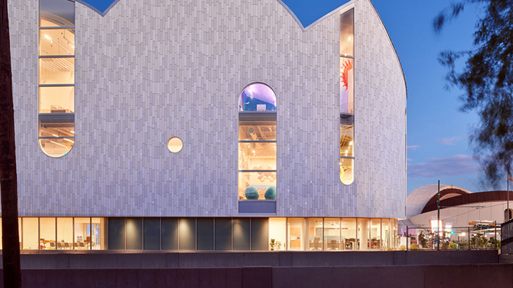 A building with windows and lights.