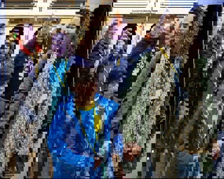 People using the Elizabeth Line in London