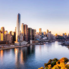 A city skyline with a river.