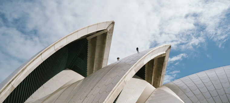 Roof of the Sydney Opera House with workers undertaking checks
