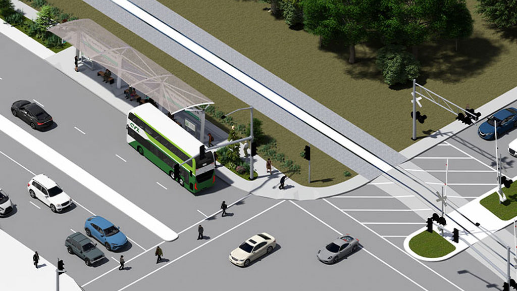 A high angle view of cars and a bus at an intersection