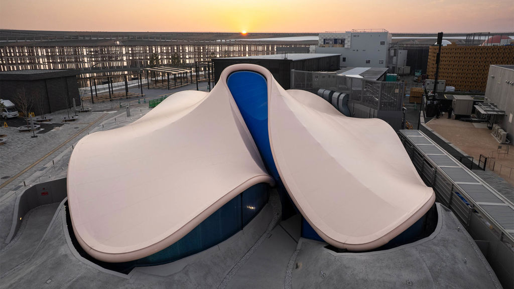 A group of large white and blue cylinders.