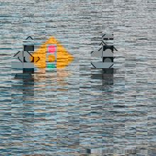Road sign surrounded by water