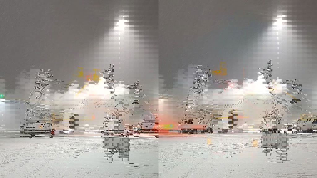 Plane being de-iced