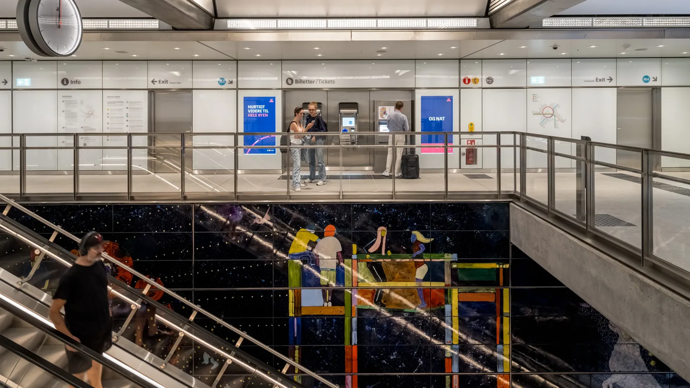 People inside one of Copenhagen's metro stations