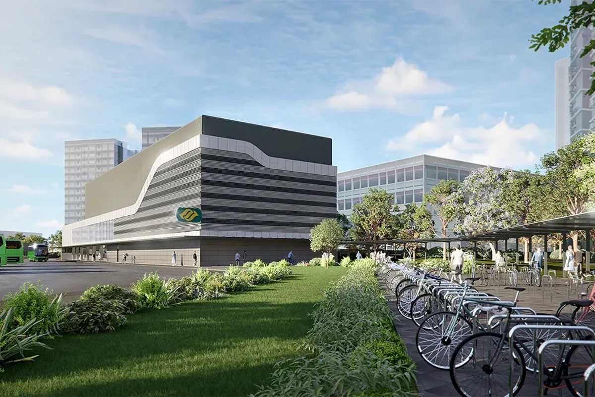 Sketch of multistorey station with bicycle stand, covered pathway and greenery