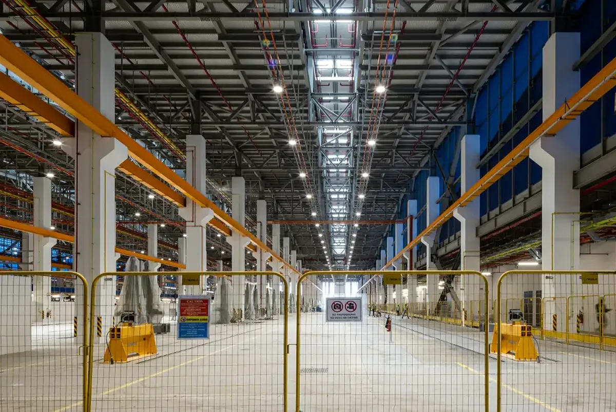 Inside a large workshop for train maintenance